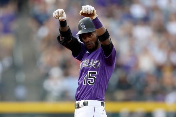 Raimel Tapia of the Colorado Rockies reacts on second base after hitting a double against the Milwaukee Brewers in the first inning at Coors Field on...