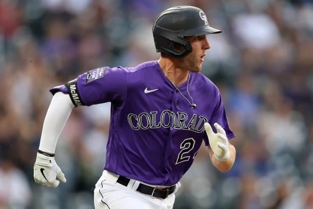 Ryan McMahon of the Colorado Rockies hits a double against the Milwaukee Brewers in the first inning at Coors Field on June 19, 2021 in Denver,...