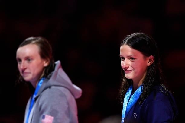 Katie Ledecky and Katie Grimes react during the Women’s 800m freestyle medal ceremony during Day Seven of the 2021 U.S. Olympic Team Swimming Trials...