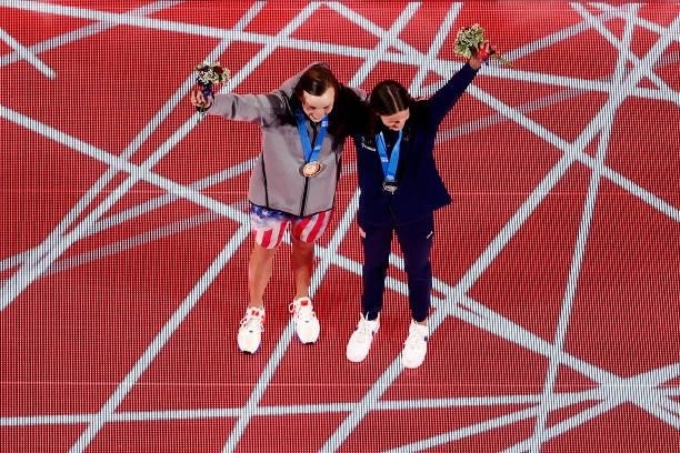 Katie Ledecky and Katie Grimes react during the Women’s 800m freestyle medal ceremony during Day Seven of the 2021 U.S. Olympic Team Swimming Trials...