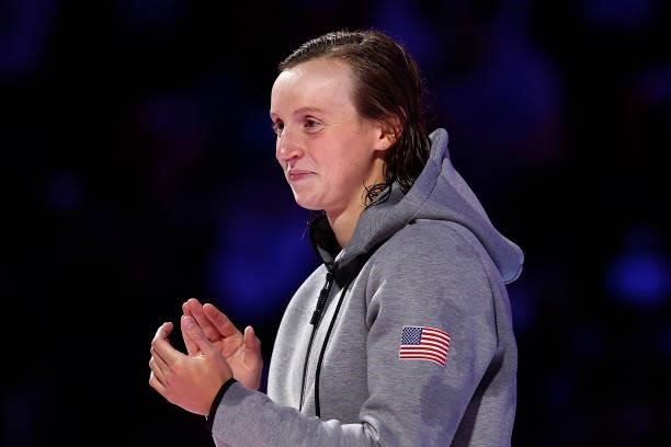 Katie Ledecky reacts during the Women’s 800m freestyle medal ceremony during Day Seven of the 2021 U.S. Olympic Team Swimming Trials at CHI Health...