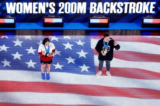 Rhyan White and Phoebe Bacon react during the Women’s 200m backstroke medal ceremony during Day Seven of the 2021 U.S. Olympic Team Swimming Trials...