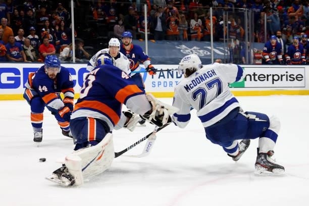 Ryan McDonagh of the Tampa Bay Lightning shoots against Semyon Varlamov of the New York Islanders during the third period in Game Four of the Stanley...
