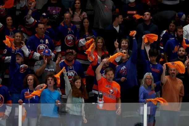 New York Islanders fans react during the third period of the game against the Tampa Bay Lightning in Game Four of the Stanley Cup Semifinals during...