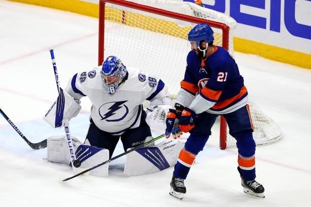 Kyle Palmieri of the New York Islanders plays the puck against Andrei Vasilevskiy of the Tampa Bay Lightning during the third period in Game Four of...