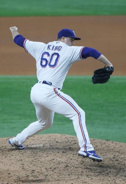 John King of the Texas Rangers pitches against the Minnesota Twins during the seventh inning at Globe Life Field on June 19, 2021 in Arlington, Texas.
