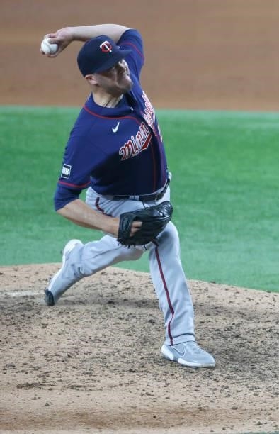 Caleb Thielbar of the Minnesota Twins pitches against the Texas Rangers during the seventh inning at Globe Life Field on June 19, 2021 in Arlington,...