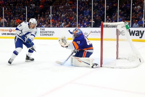 Semyon Varlamov of the New York Islanders makes a save on a shot by Yanni Gourde of the Tampa Bay Lightning during the third period in Game Four of...