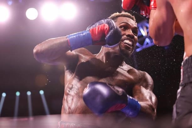 Jermall Charlo and Juan Macias Montiel exchange punches during their WBC middleweight title fight at Toyota Center on June 19, 2021 in Houston, Texas.
