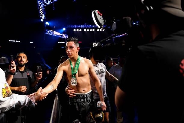 Juan Macias Montiel exits the ring following his WBC middleweight title fight against Jermall Charlo at Toyota Center on June 19, 2021 in Houston,...