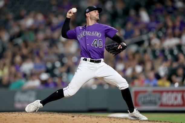 Pitcher Tyler Kinley of the Colorado Rockies throws against the Milwaukee Brewers in the ninth inning at Coors Field on June 19, 2021 in Denver,...