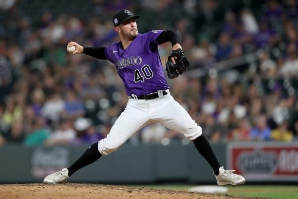 Pitcher Tyler Kinley of the Colorado Rockies throws against the Milwaukee Brewers in the ninth inning at Coors Field on June 19, 2021 in Denver,...