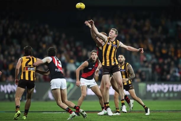 Ben McEvoy of the Hawks contests the ball during the round 14 AFL match between the Hawthorn Hawks and the Essendon Bombers at University of Tasmania...