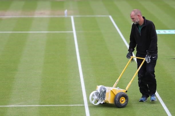 Ground staff member prepares the court during day 8 of the Nottingham Trophy at Nottingham Tennis Centre on June 20, 2021 in Nottingham, England.