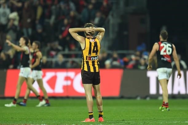 Jack Scrimshaw of the Hawks reacts after the final siren during the round 14 AFL match between the Hawthorn Hawks and the Essendon Bombers at...