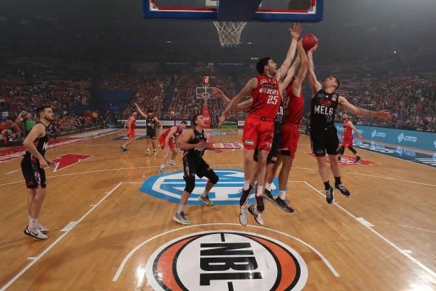 Corey Shervill and Will Magnay of the Wildcats contest for a rebound against Jock Landale and Mitch McCarron of Melbourne United during game two of...