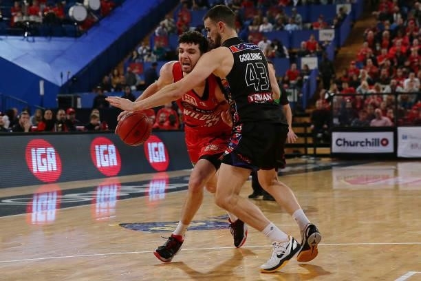 Corey Shervill of the Wildcats tries to get past Chris Goulding of Melbourne United during game two of the NBL Grand Final Series between the Perth...