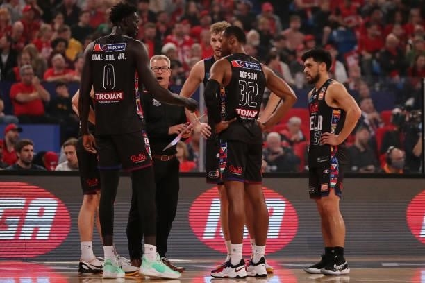 Dean Vickerman, head coach of Melbourne United addresses his players during game two of the NBL Grand Final Series between the Perth Wildcats and...