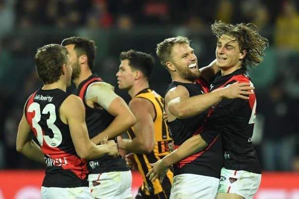 Harrison Jones and Jake Stringer of the Bombers celebrate a goal during the round 14 AFL match between the Hawthorn Hawks and the Essendon Bombers at...