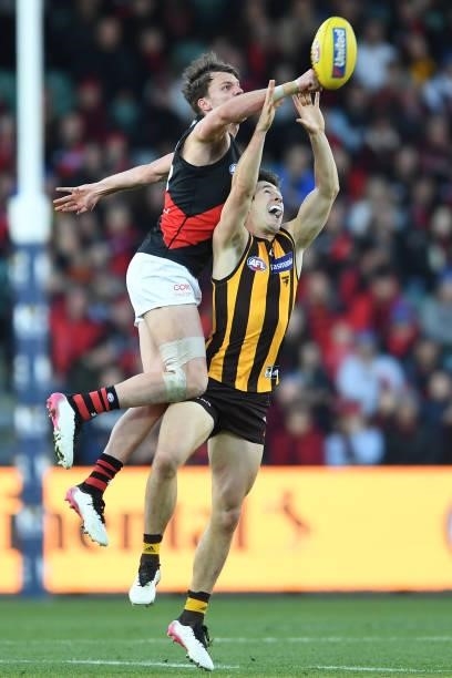 Darcy Parish of the Bombers contests the ball during the round 14 AFL match between the Hawthorn Hawks and the Essendon Bombers at University of...
