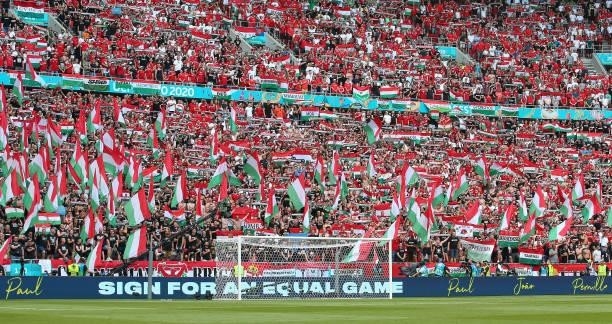 Supporters of Hungary are seen as a 'Sign For An Equal Game' message is displayed on the perimeter boards prior to the UEFA Euro 2020 Championship...