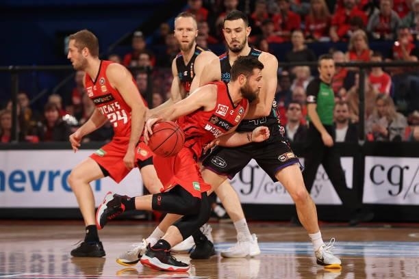 Mitchell Norton of the Wildcats drives to the key against Chris Goulding of Melbourne United during game two of the NBL Grand Final Series between...