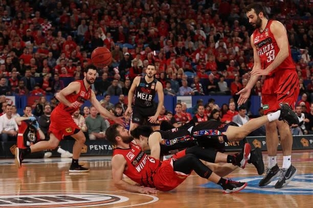 Mitchell Norton of the Wildcats fouls Yudai Baba of Melbourne United during game two of the NBL Grand Final Series between the Perth Wildcats and...