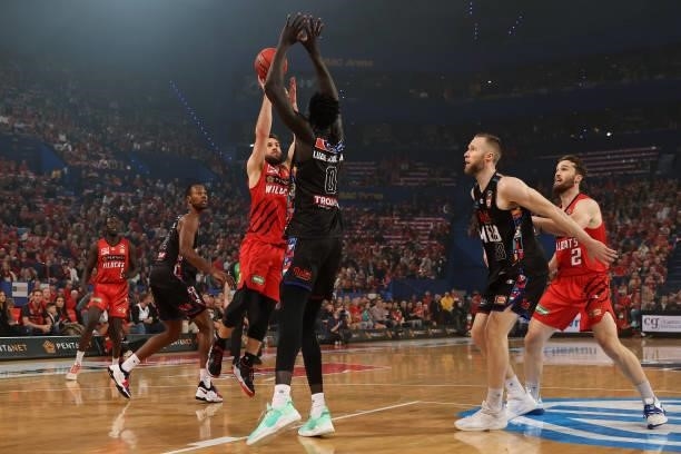 Mitchell Norton of the Wildcats puts a shot up against Jo Lual-Acuil of Melbourne United during game two of the NBL Grand Final Series between the...