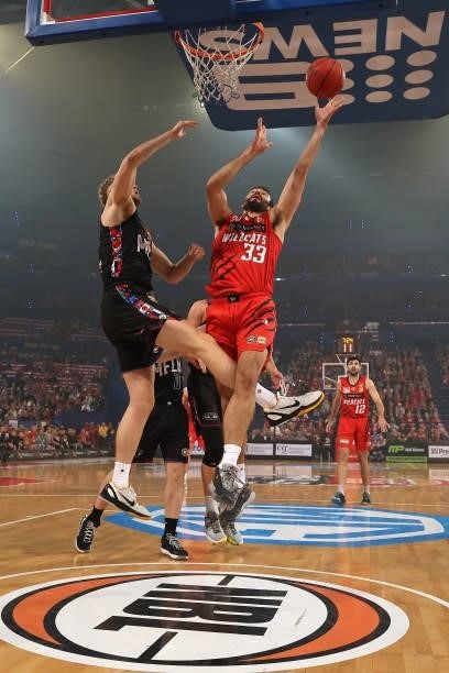 John Mooney of the Wildcats goes to the basket against Jock Landale of Melbourne United during game two of the NBL Grand Final Series between the...