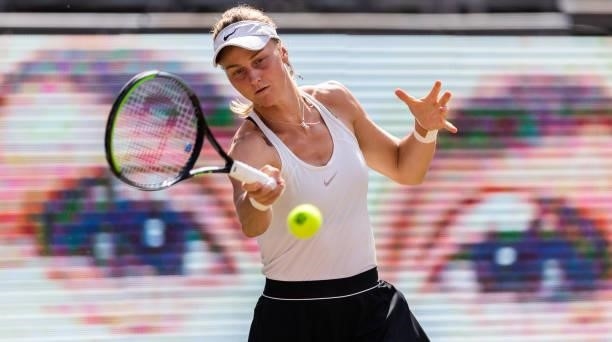 Liudmila Samsonova of Russia hits a forehand against Belinda Bencic of Switzerland in the women's singles final match during day 9 of the bett1open...