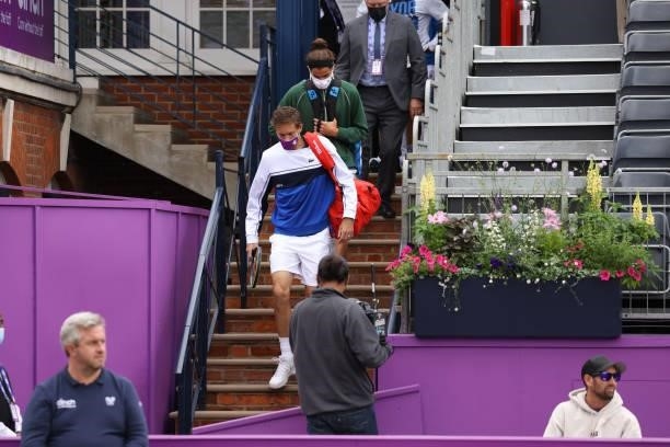 Nicolas Mahut of France and Pierre-Hugues Herbert of France walk onto the court ahead of the finals between Reilly Opelka of USAand John Peers of...