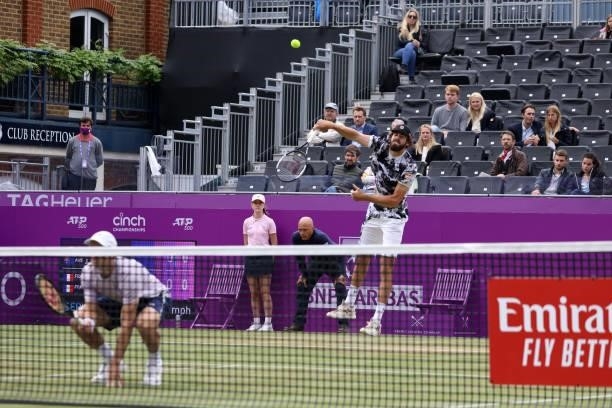 Reilly Opelka of USA, playing partner of John Peers of Australia serves during their Finals match against Pierre-Hugues Herbert of France and Nicolas...