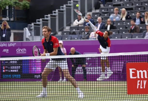 Nicolas Mahut of France, playing partner of Pierre-Hugues Herbert of France looks on during the finals against Reilly Opelka of USA and \John Peers...