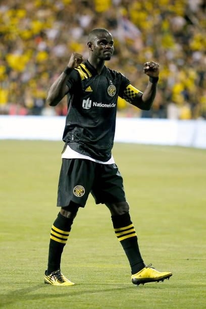 Jonathan Mensah of the Columbus Crew waves to the fans after defeating the Chicago Fire FC during the last match played at Historic Crew Stadium on...