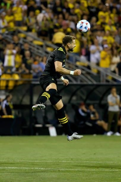 Josh Williams of the Columbus Crew heads the ball during the match against the Chicago Fire FC on June 19, 2021 in Columbus, Ohio. Columbus defeated...