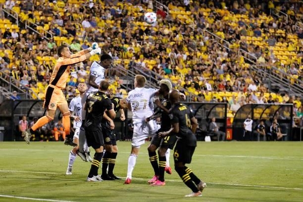 Evan Bush of the Columbus Crew makes a save during the match against the Chicago Fire FC on June 19, 2021 in Columbus, Ohio. Columbus defeated...