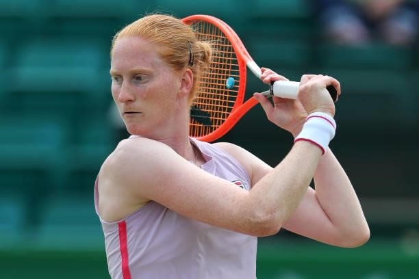 Alison Van Uytvanck of Belgium hits a backhand in the Finals match against Arina Rodionova of Australia during the ITF W100 Final of the Nottingham...