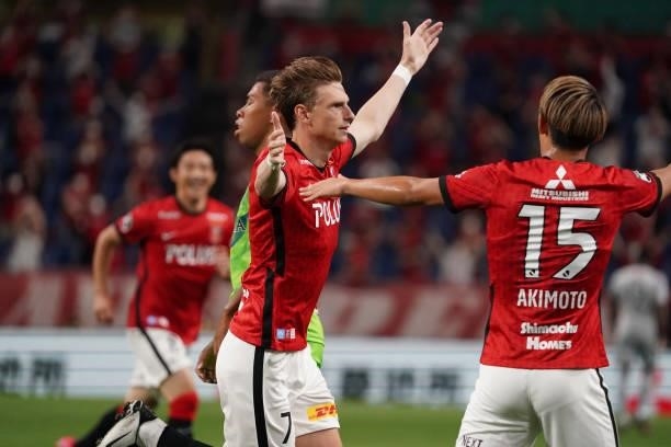 Kasper Junker of Urawa Red Diamonds celebrates scoring his side's first goal during the J.League Meiji Yasuda J1 match between Urawa Red Diamonds and...