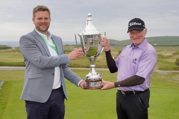 Chris Williams of South Africa and Mark Aspland, Head of Legends Tour pose with the trophy after the final round of the Farmfoods European Legends...