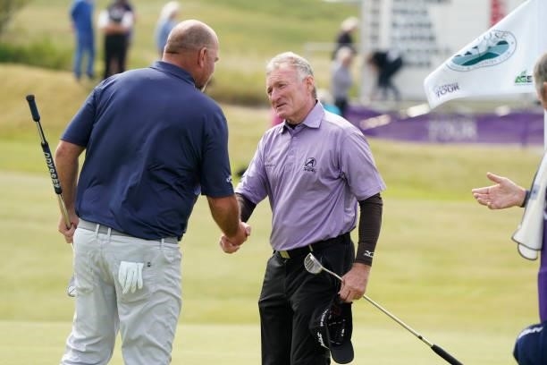 Chris Williams of South Africa and Thomas Bjorn of Denmark in action during the final round of the Farmfoods European Legends Links Championship at...