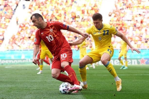 Goran Pandev of North Macedonia battles for possession with Mykola Matviyenko of Ukraine during the UEFA Euro 2020 Championship Group C match between...