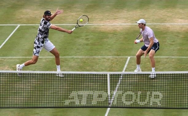 Reilly Opelka of USA, playing partner of John Peers of Australia plays a forehand during their Finals match against Pierre-Hugues Herbert of France...