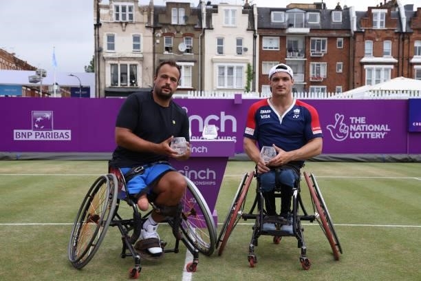 Gustavo Fernández of Argentina and Tom Egberink of Neatherlands during the trophy presentation after finishing second in the wheelchair finals during...