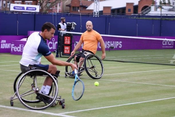 Stefan Olsson of Sweden and Joachim Gérard of Belgium in action during the wheelchair finals during Day 7 of The cinch Championships at The Queen's...