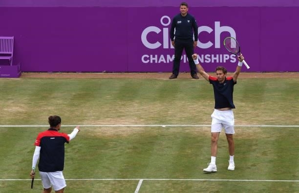 Pierre-Hugues Herbert of France, and Nicolas Mahut of France celebrate match point during the finals against Reilly Opelka of USA and \John Peers of...