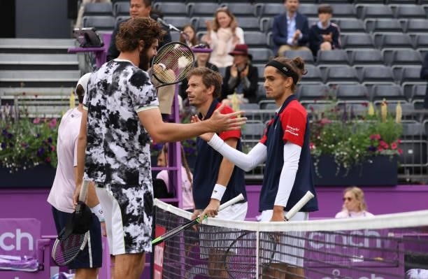 Reilly Opelka of USA and John Peers of Australia congratulate each other after the Finals between Pierre-Hugues Herbert of France and Nicolas Mahut...