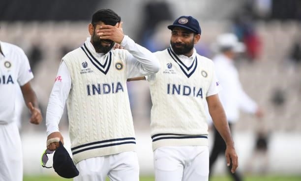 Virat Kohli of India reacts as he leads his team off the field after bad light stops play during Day 3 of the ICC World Test Championship Final...