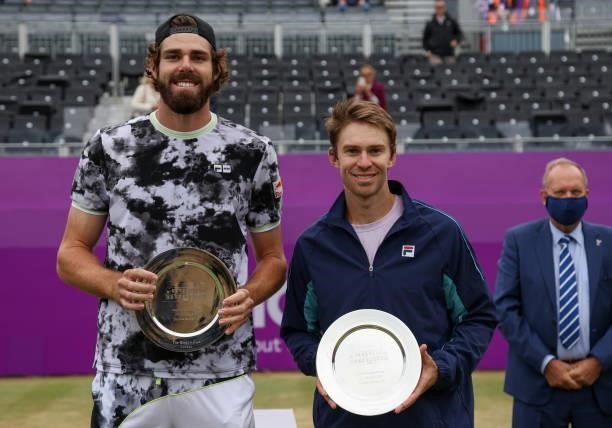 Reilly Opelka of USA and John Peers of Australia during the trophy presentation after finishing second in the mens doubles finals during Day 7 of The...