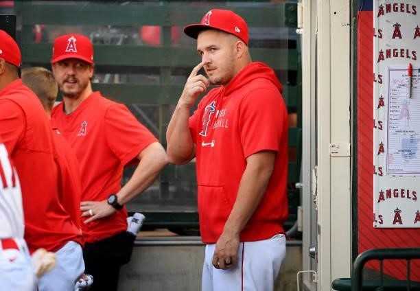 Mike Trout of the Los Angeles Angels in the dugout during the game against the Detroit Tigers at Angel Stadium of Anaheim on June 18, 2021 in...