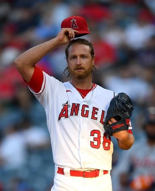 Alex Cobb of the Los Angeles Angels adjusts his cap as he stands on the mound in the game against the Detroit Tigers at Angel Stadium of Anaheim on...